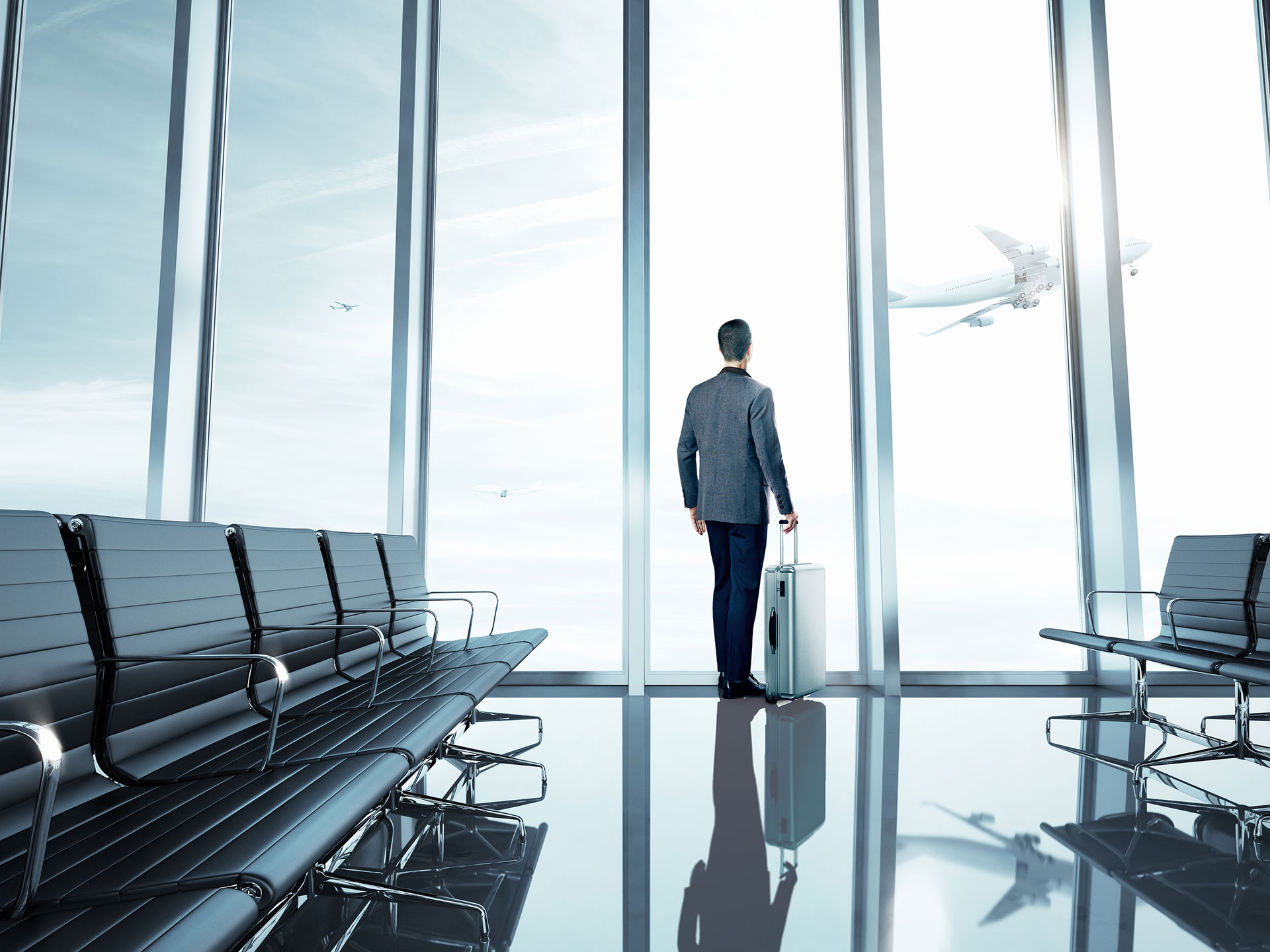 bigstock-Businessman-at-airport-66623476